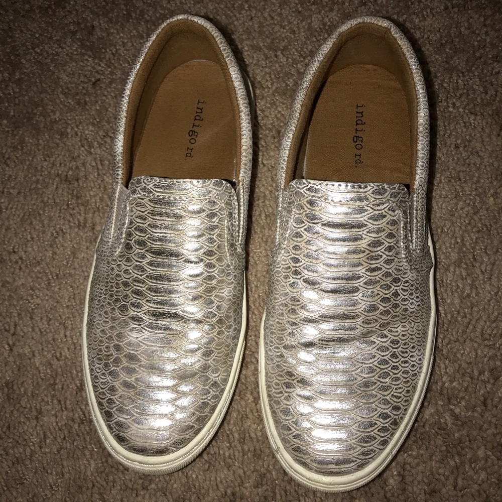 Snakeskin print slip ons